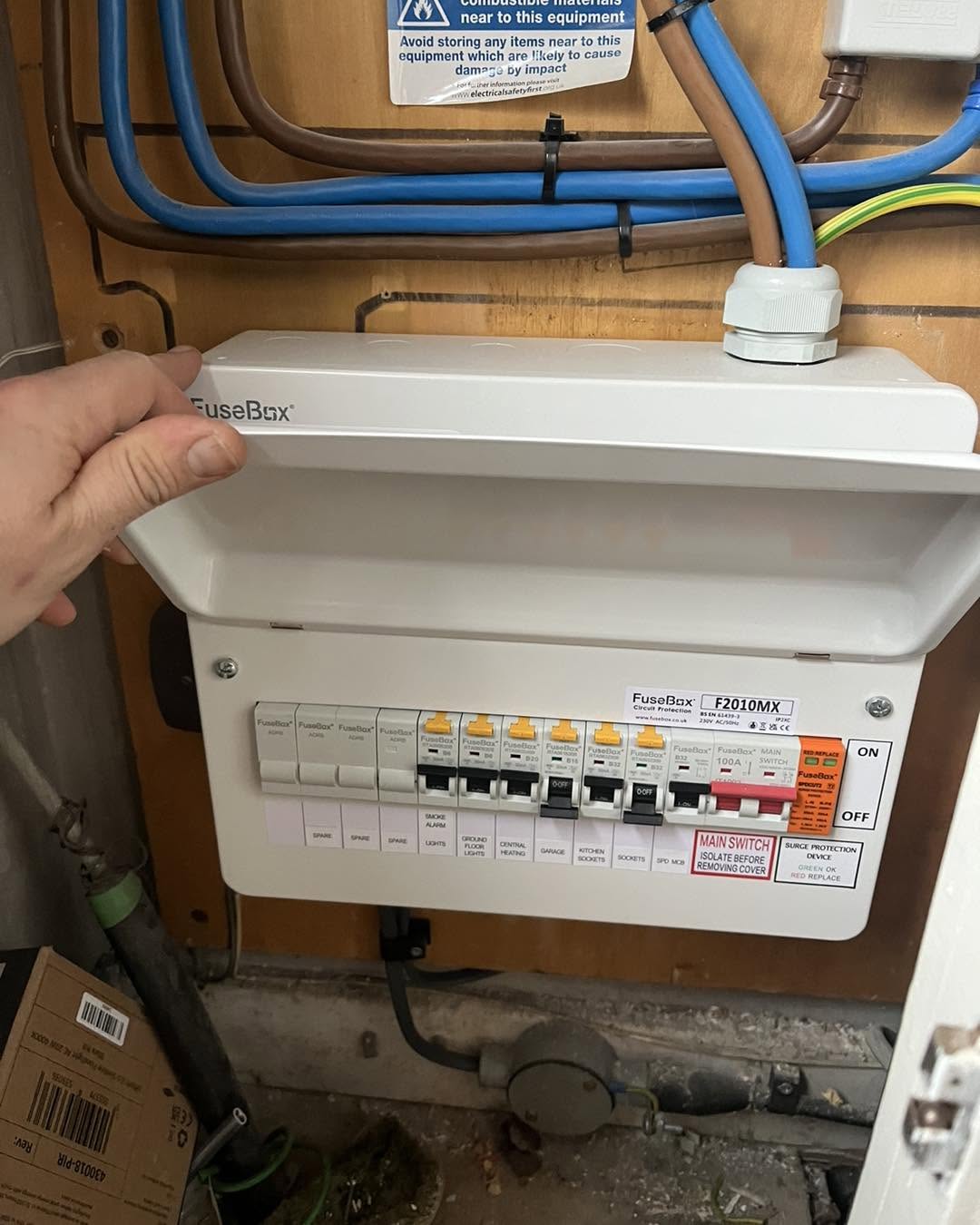 Electrician greeting a customer at their front door