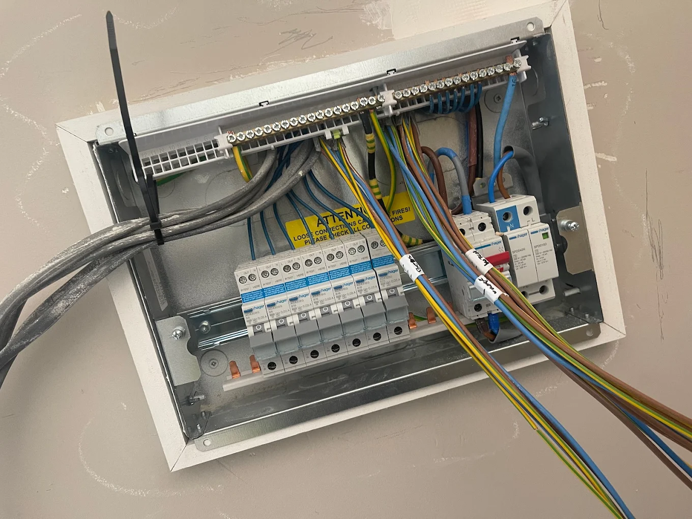 Consumer unit mid-installation with circuits exposed